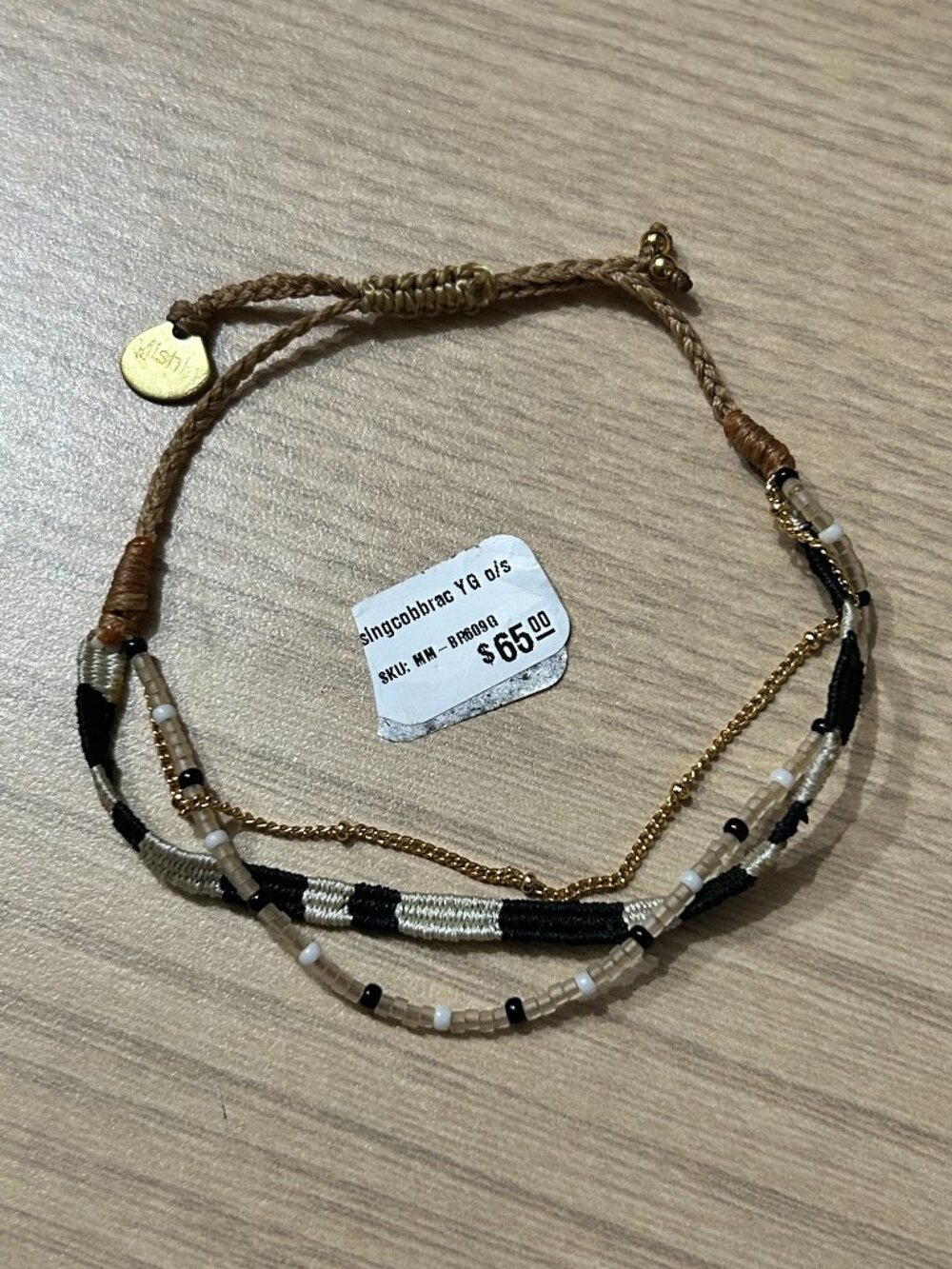 Mishky Multi Strand Beaded Layered Cord Bracelet Black Gold NWTElevate your wris